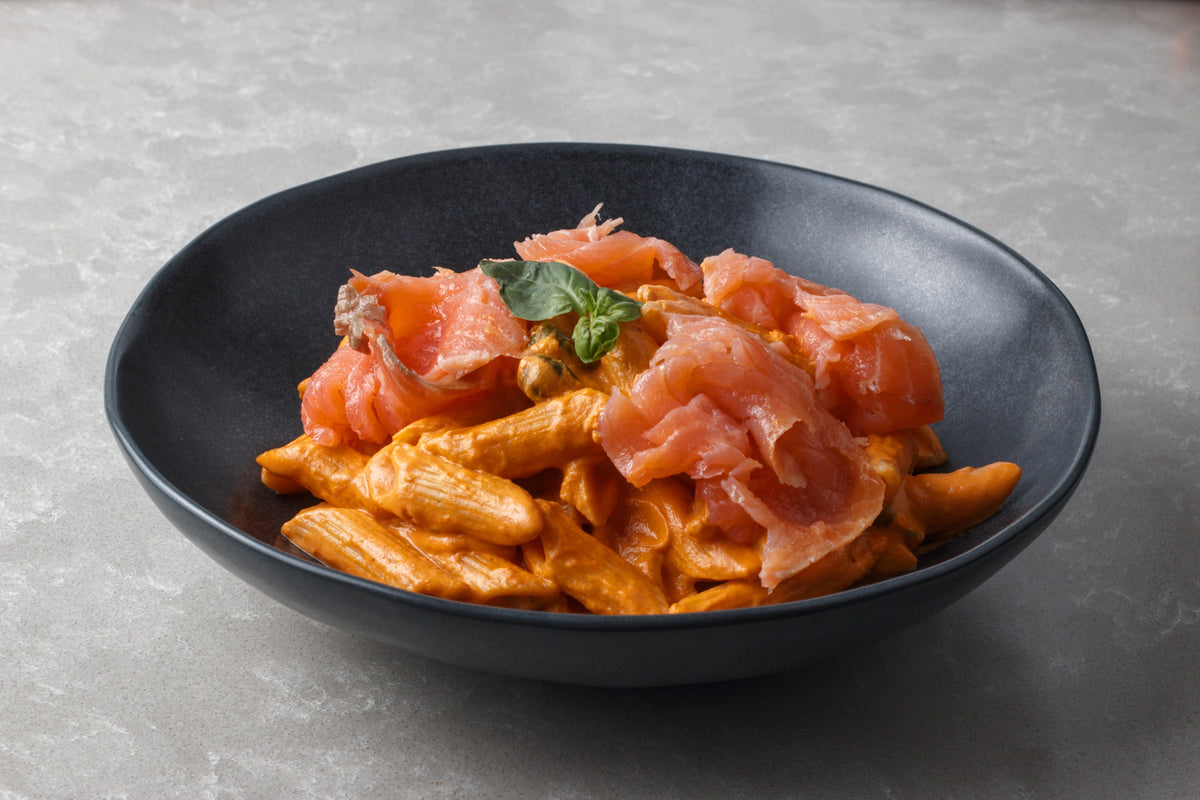 Honey mustard salmon pasta with cherry tomatoes and spinach