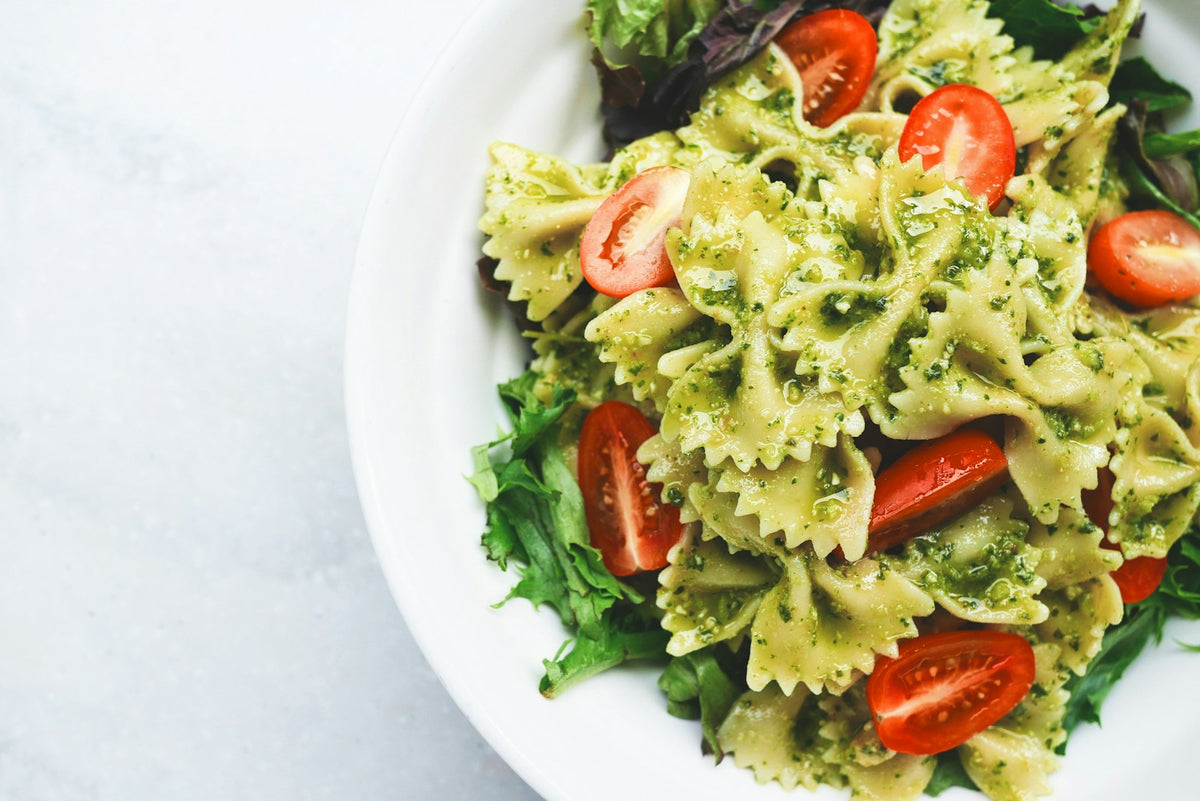 Creamy tomato spinach pasta with fresh herbs